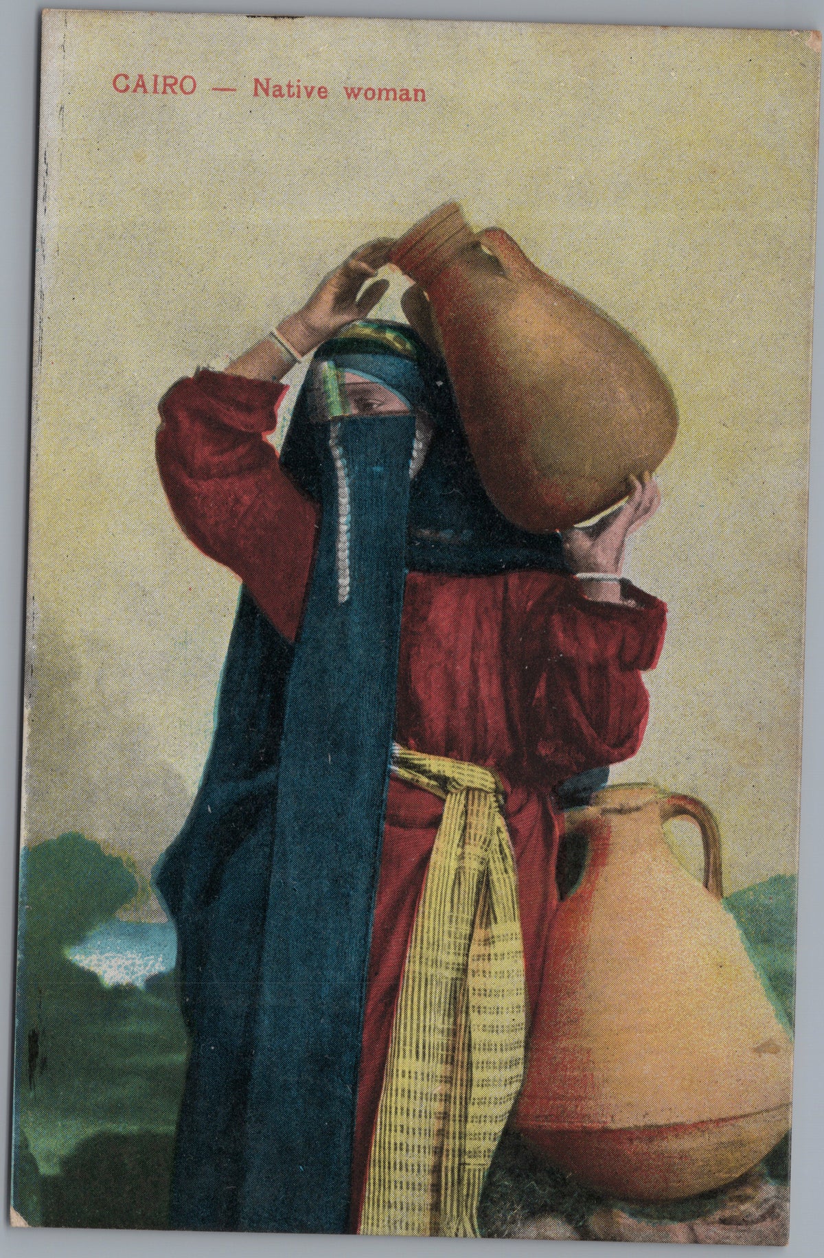PC01107 | P11 | Egypt — Woman Carrying Water Vessels — front