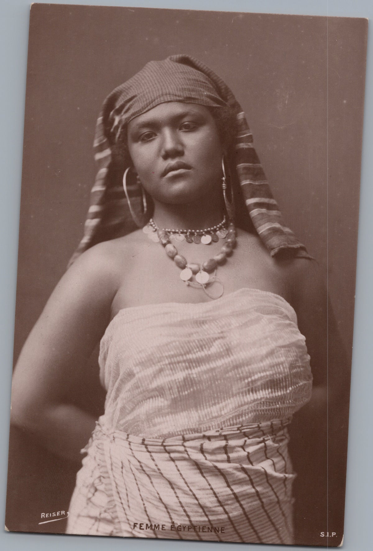 PC01358 | P36 | Egypt — Portrait with Head Covering and Jewellery — front