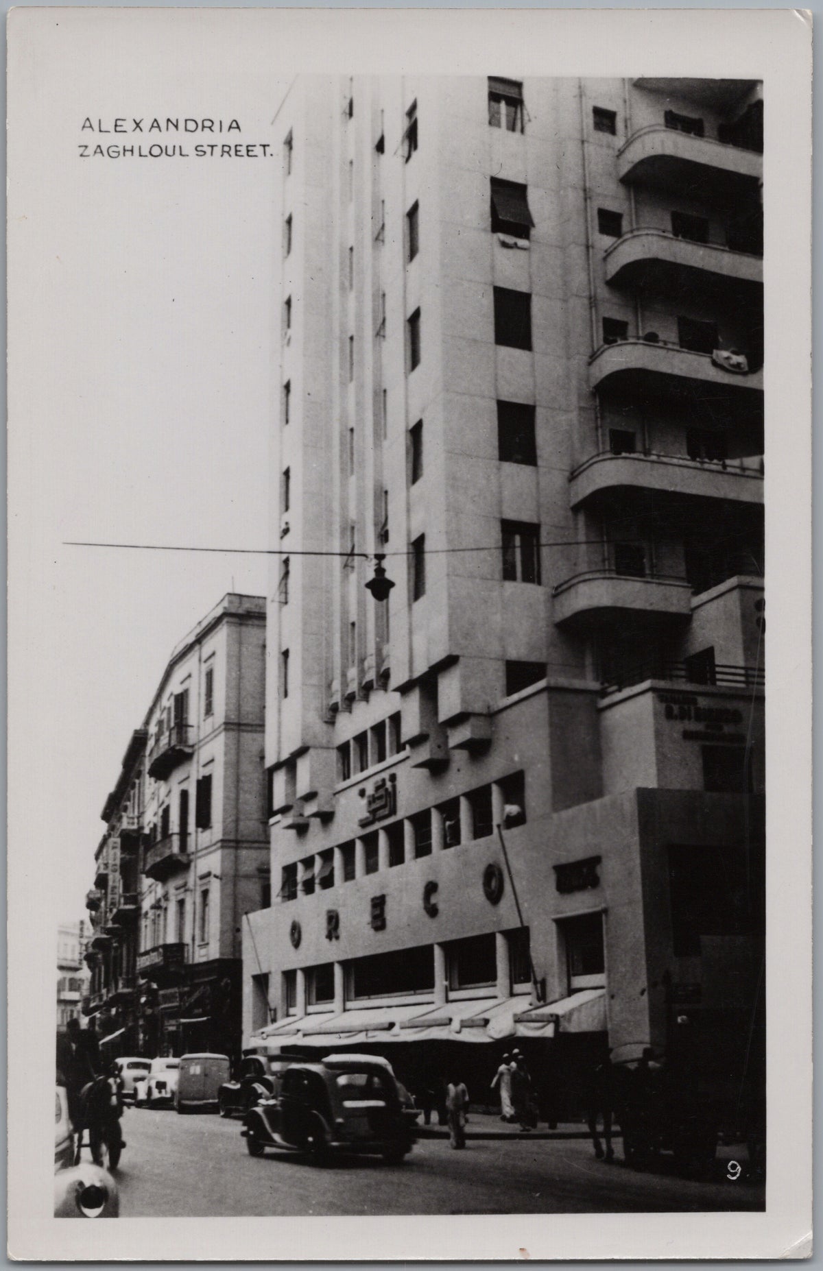 PC01369 | P37 | Alexandria — Tall Building above a City Street — front