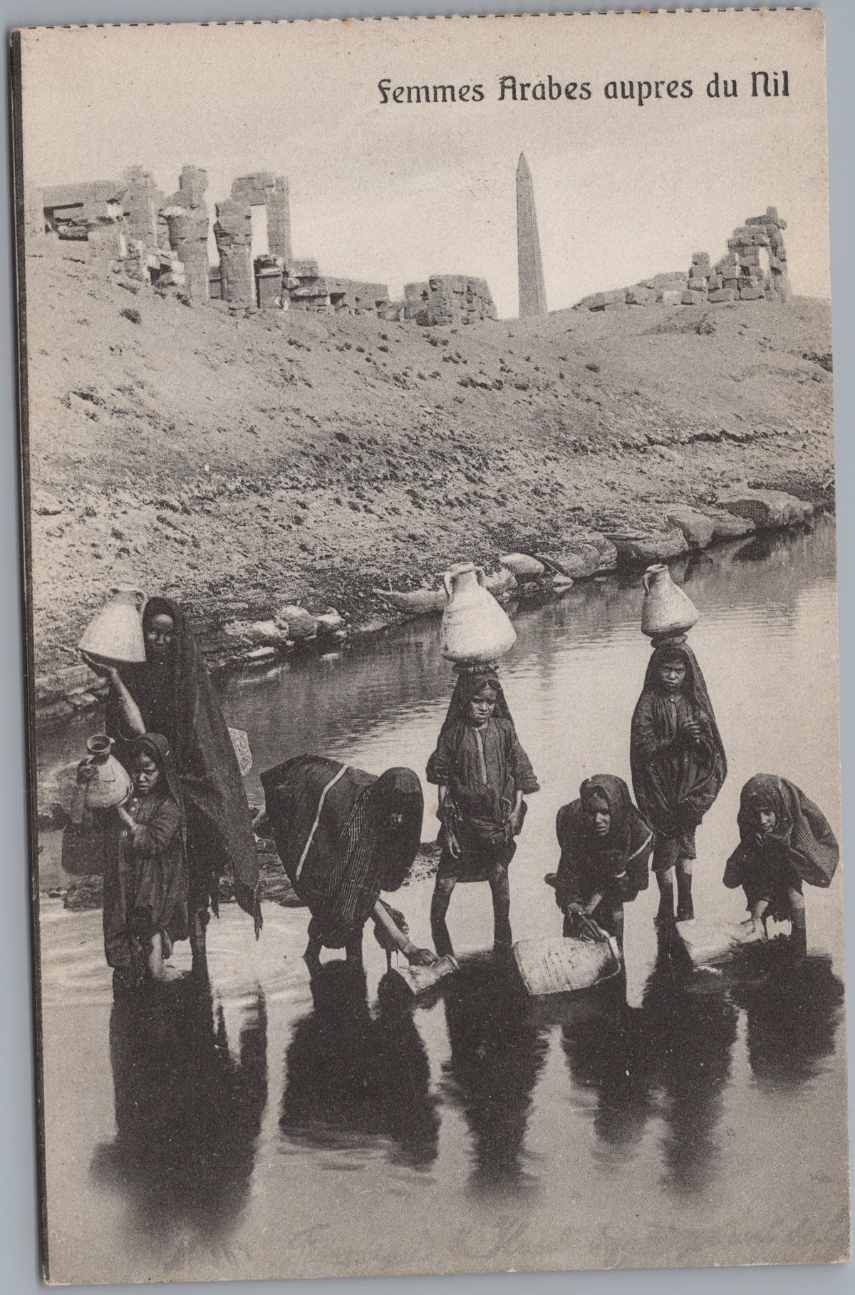 PC01425 | P43 | Luxor — Water Carriers among the Ruins — front