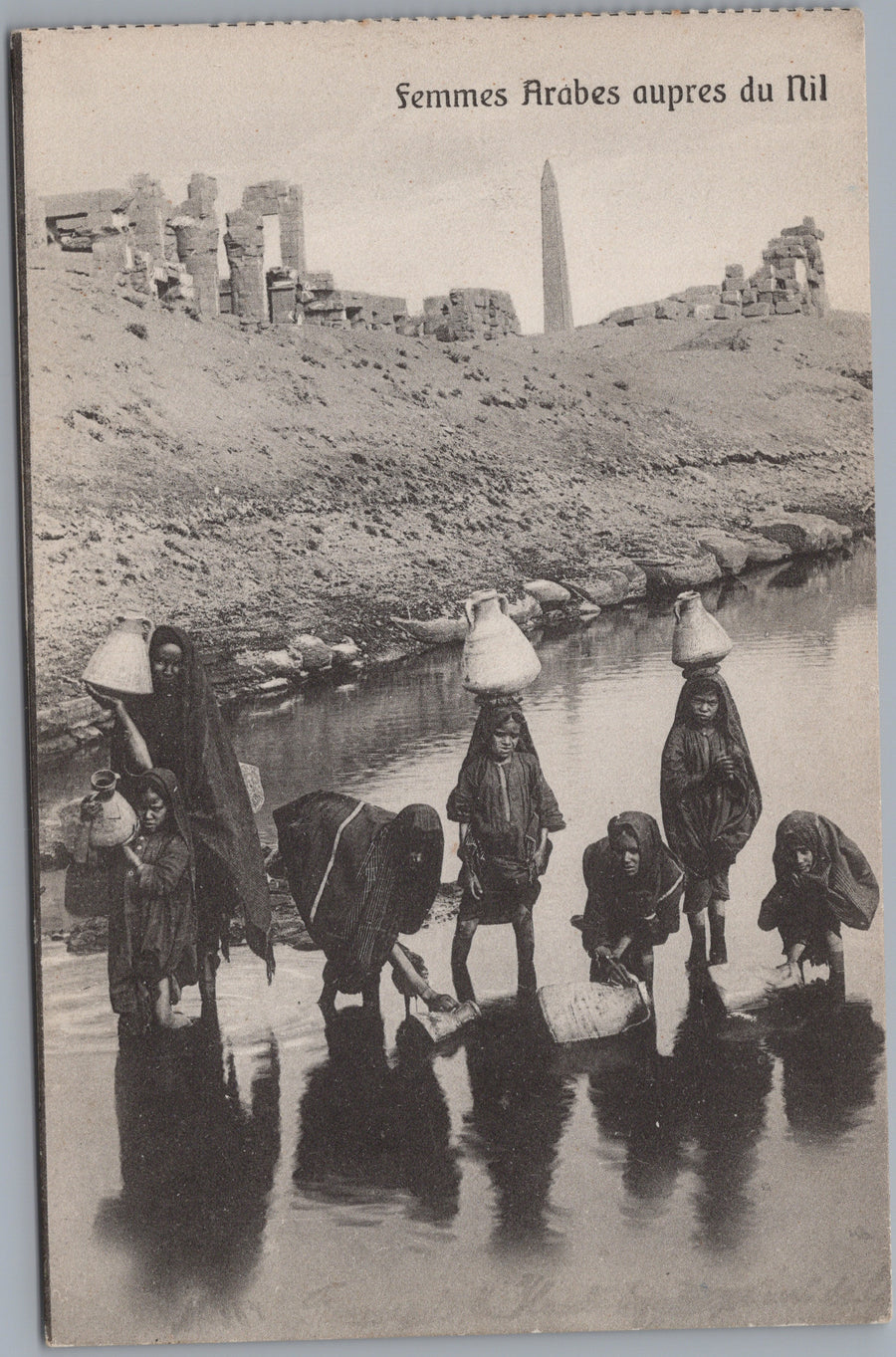Luxor — Water Carriers among the Ruins