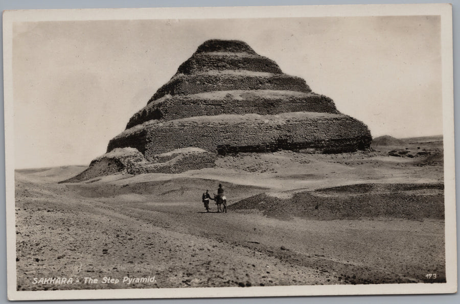 Saqqara — Step Pyramid and Figures in the Desert