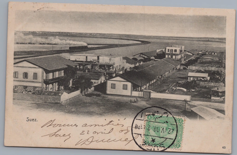 Suez — Canal-side Buildings and Steam Train