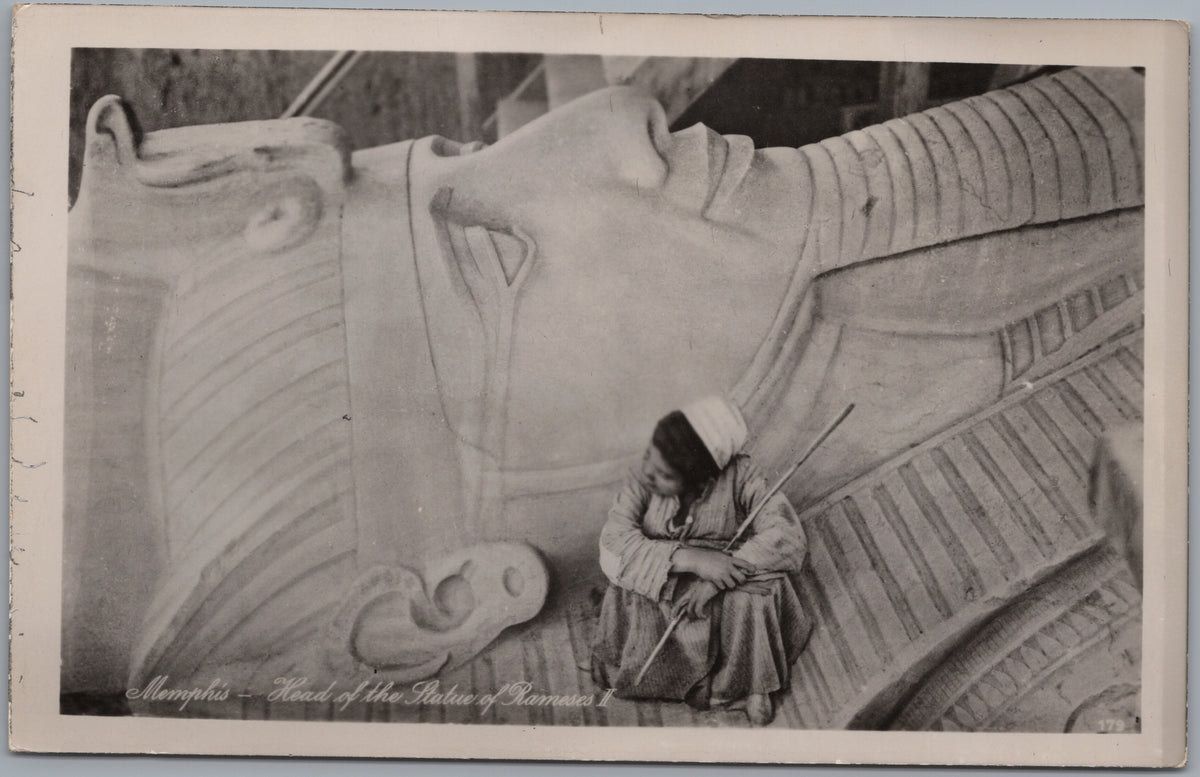 PC02195 front — Head of the Colossal Ramses Statue with Seated Figure