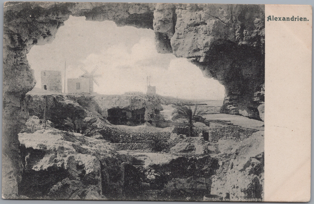 PC02198 front — Ruins and Buildings Seen through a Stone Arch