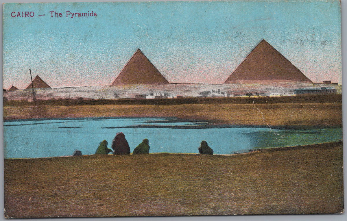 PC02361 front — Pyramids beyond Water and Seated Figures