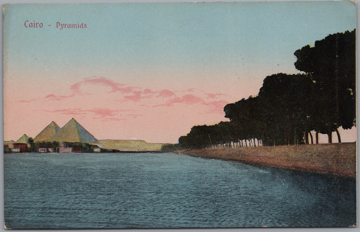 PC02379 front — Pyramids beside a Tree-Lined Waterway