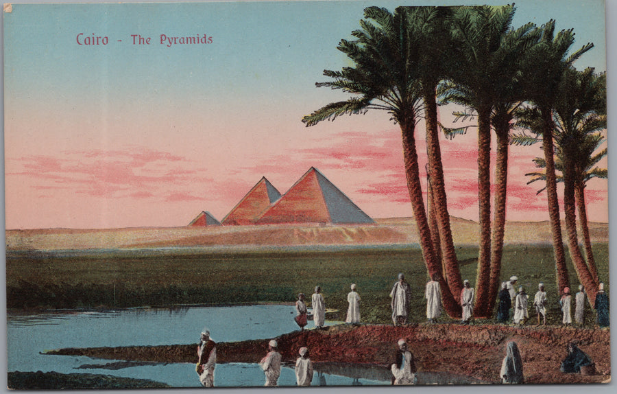 Giza — Pyramids, Palms and Waterside Figures