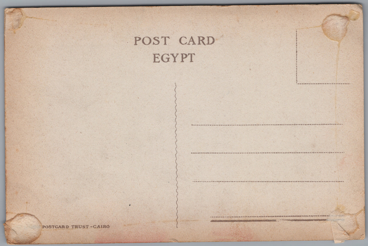 PC01114 | P12 | Egypt — Travellers beside a Loaded Camel — reverse