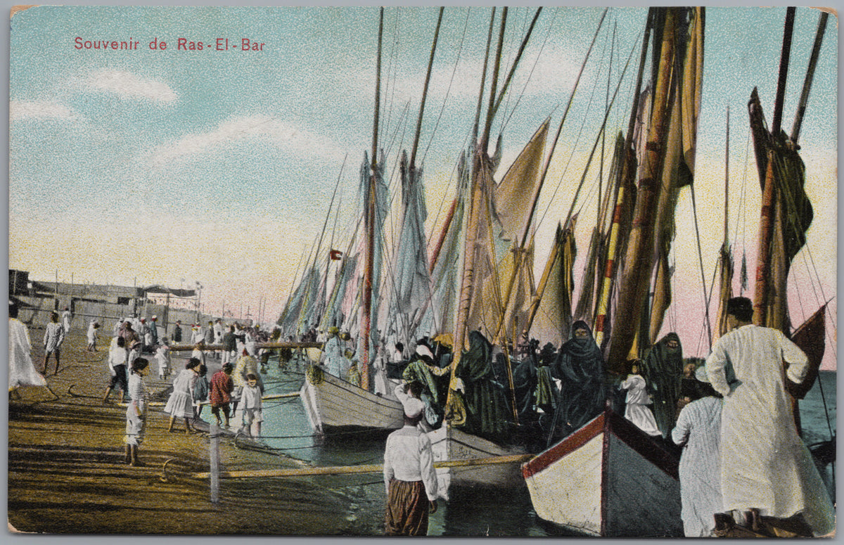 PC01129 | P13 | Port Said — Boats and People along the Quay — front