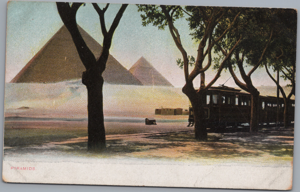 PC01317 | P32 | Giza — Tram beneath Trees near the Pyramids — front
