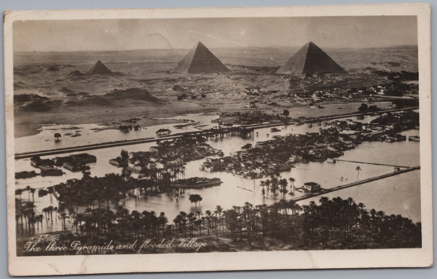Giza — Pyramids beyond Flooded Fields