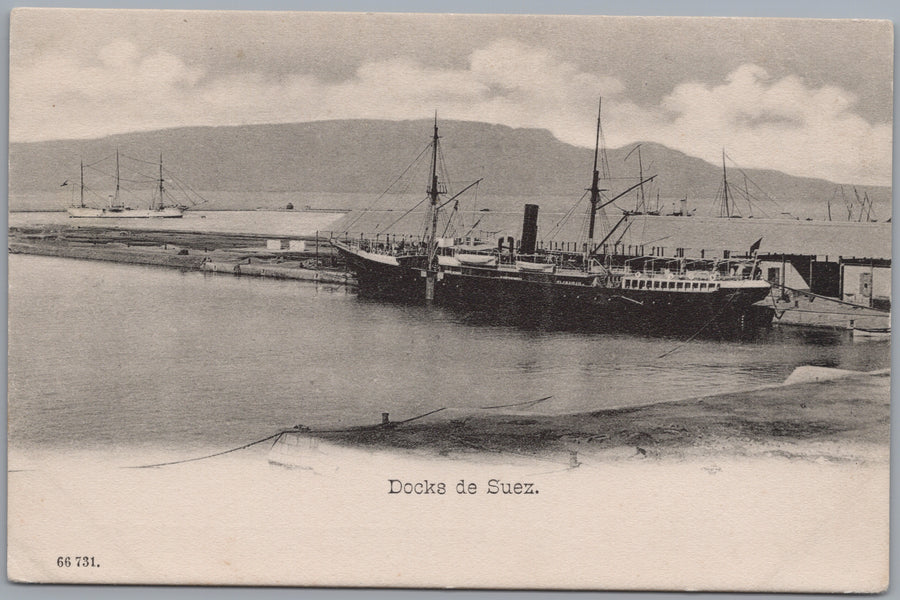 Suez — Docked Steamship and Distant Hills