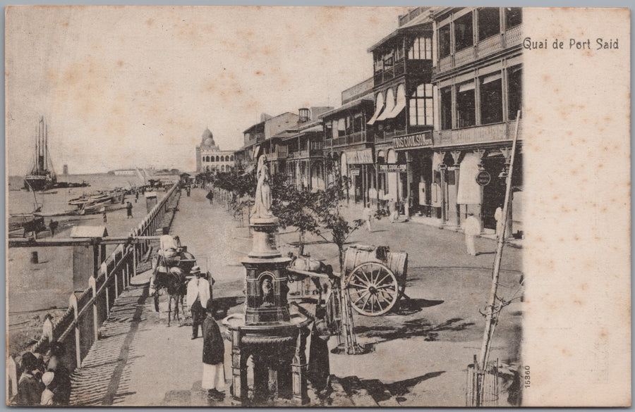 Port Said — Quayside Shops, Boats and Water Fountain