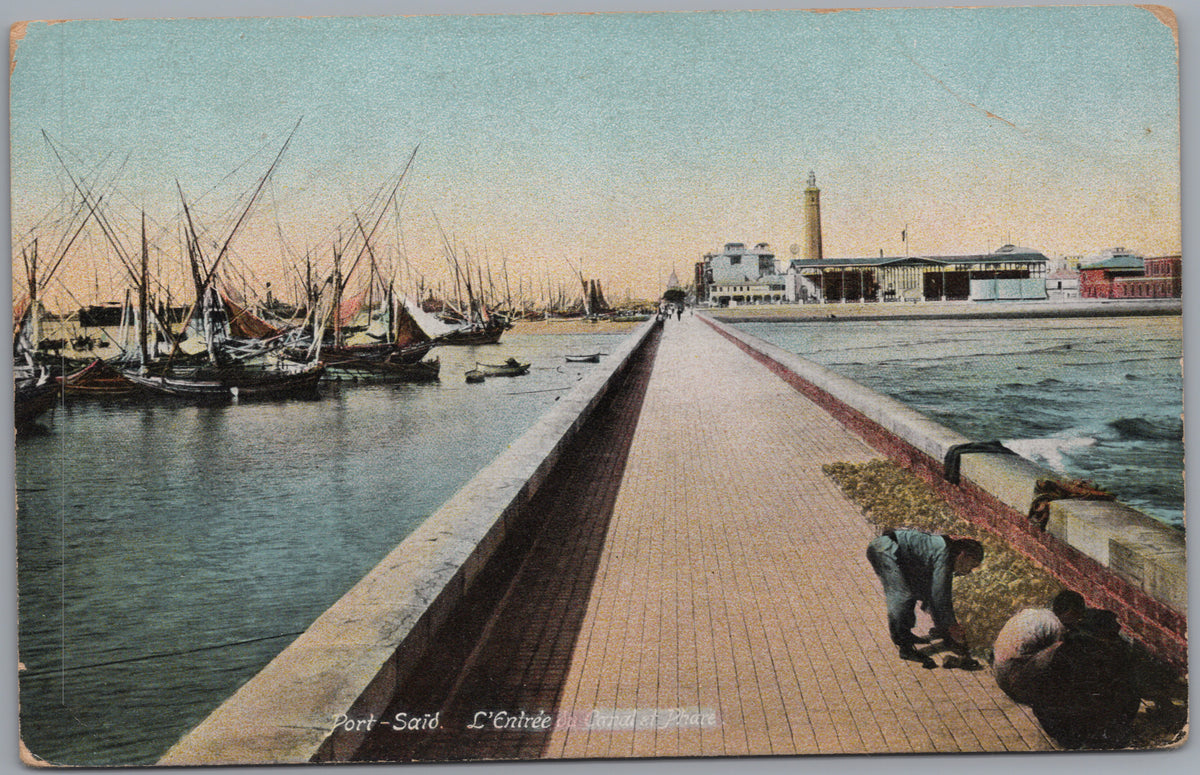 PC02101 front — Canal Entrance Jetty and Moored Sailing Boats