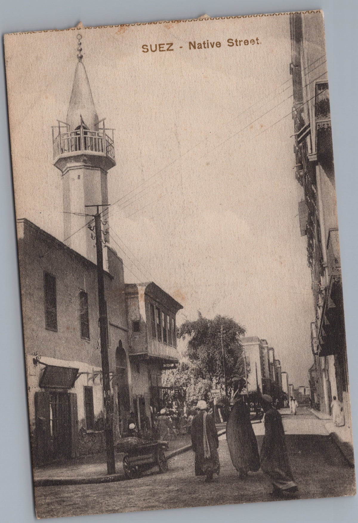 PC02136 front — Street with Minaret and Pedestrians
