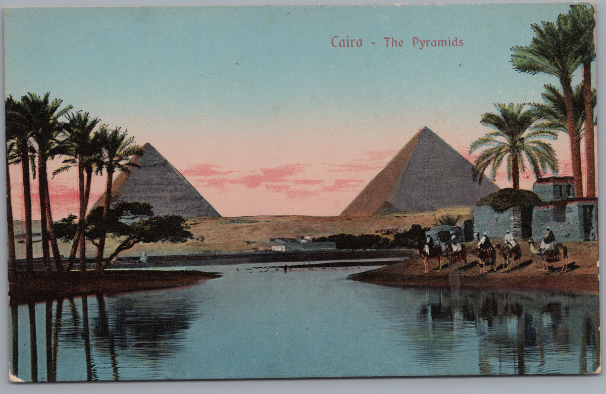 PC02150 front — Pyramids Reflected in Water with Palms and Camels