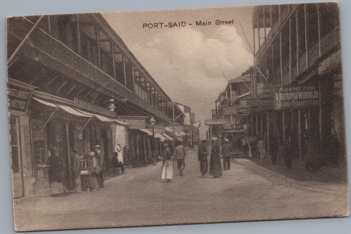 PC02153 front — Main Street Shops and Wooden Balconies