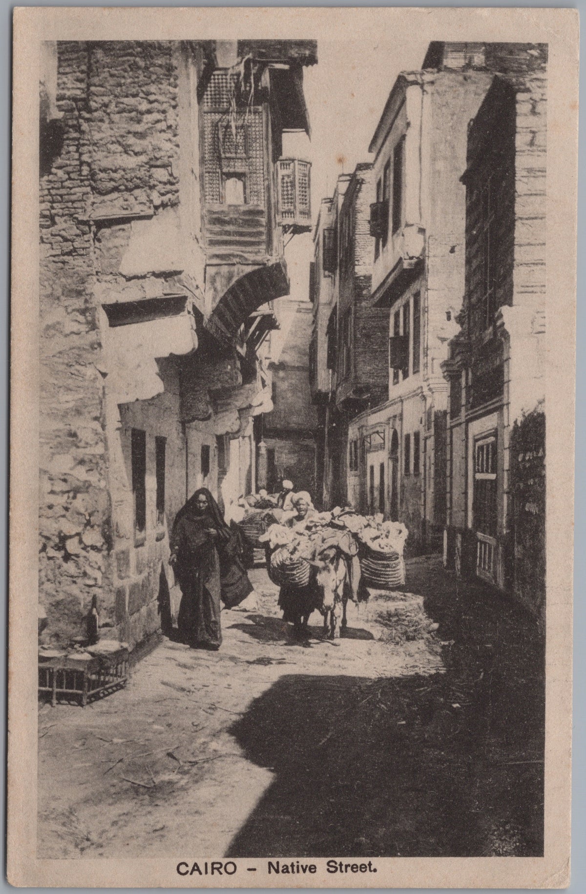 PC02206 front — Narrow Street with Figures and Projecting Windows