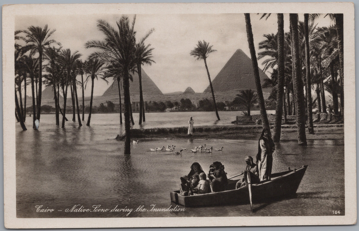 PC02222 front — Boat among Flooded Palms with Pyramids Beyond