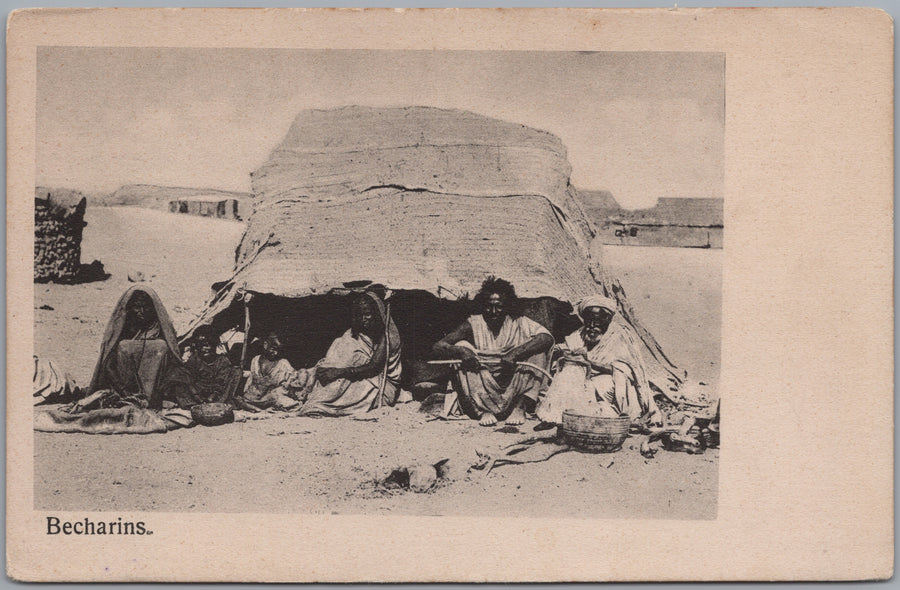Egypt — Group Seated beside a Woven Shelter