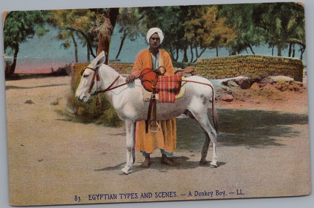 PC02362 front — Donkey Handler with Saddled Donkey