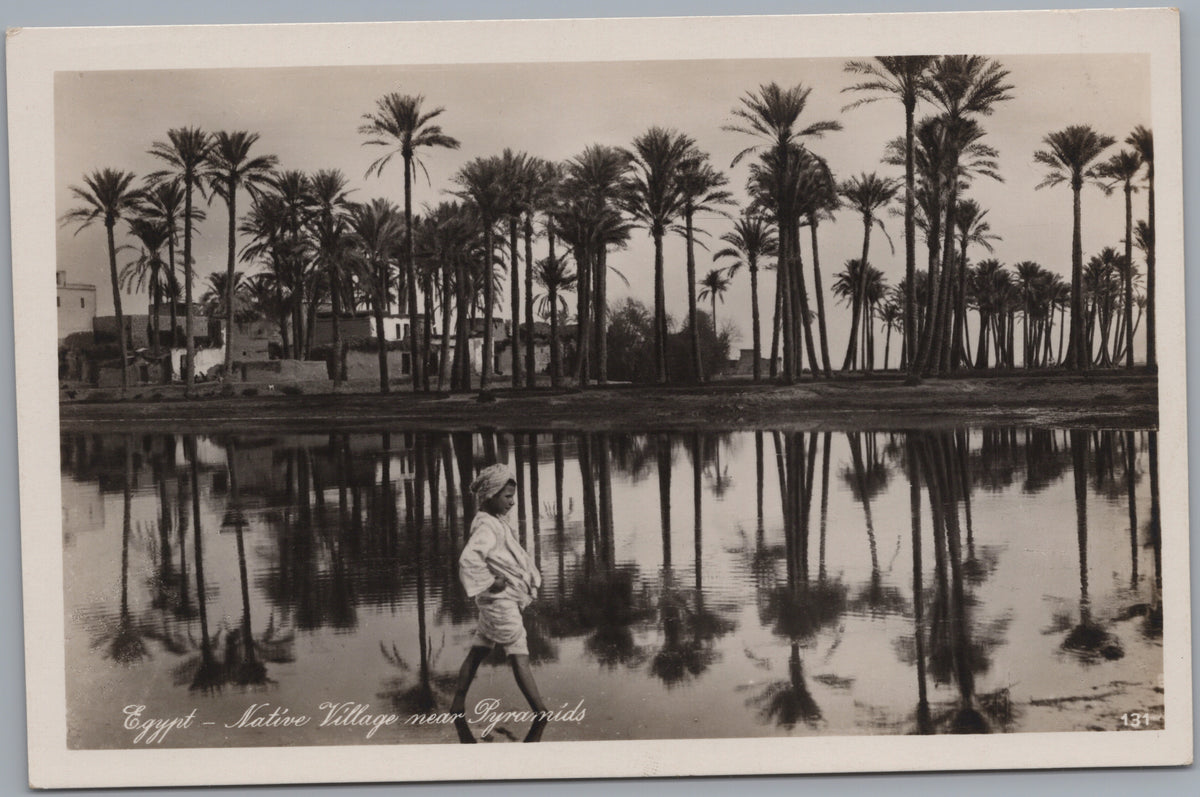 PC02388 front — Mena Village Palms Reflected in Water