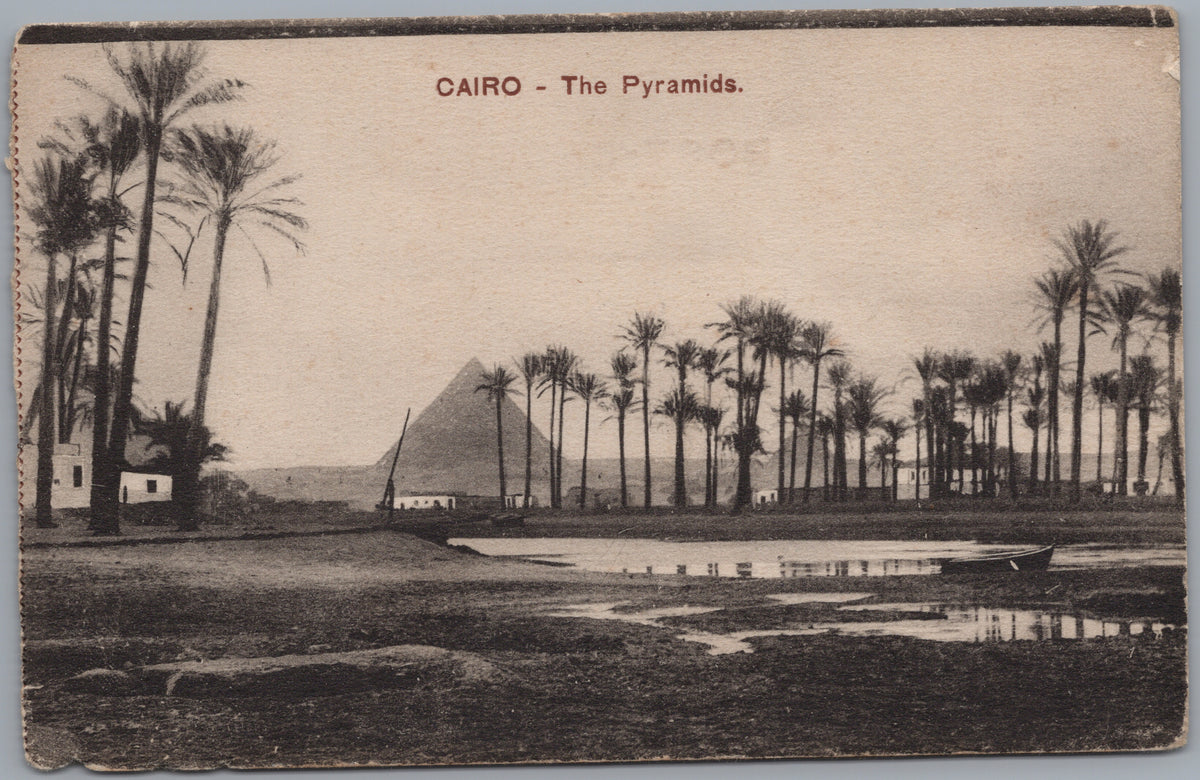 PC02402 front — Pyramid beyond Palms and Water